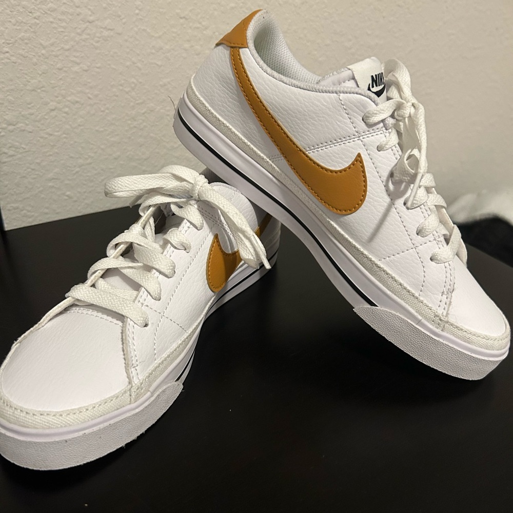 Nike White and Gold Athletic Shoes
